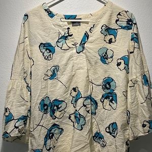 woman tan blue floral